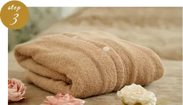 step03、エステサロンのベットの上に置かれたガウン